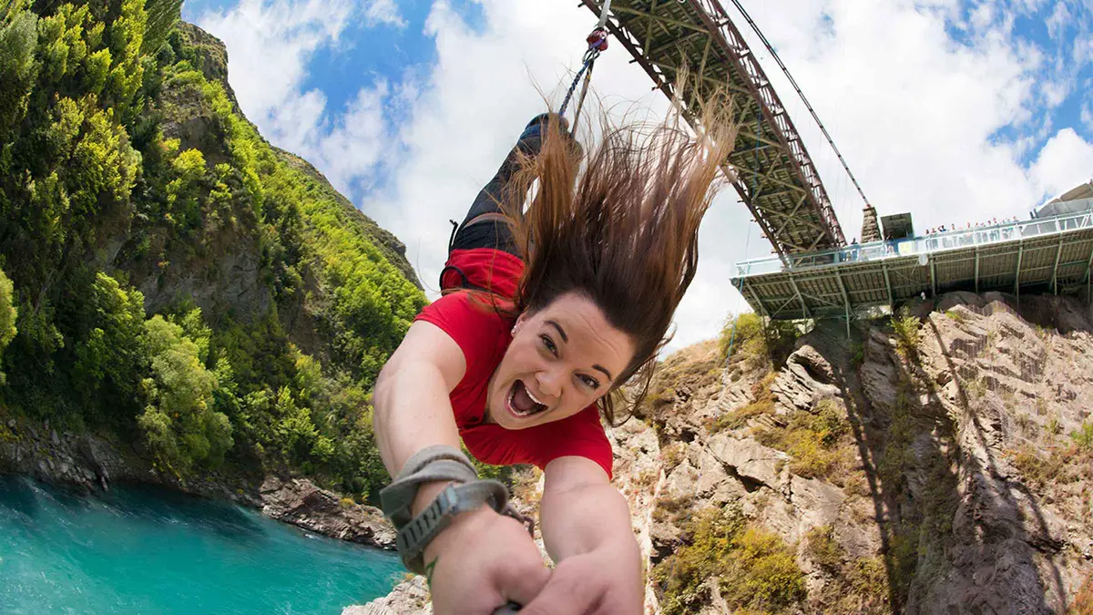 A jumper falling from the bridge towards the Kawarau River — Kawarau Bridge bungy, Queenstown, New Zealand