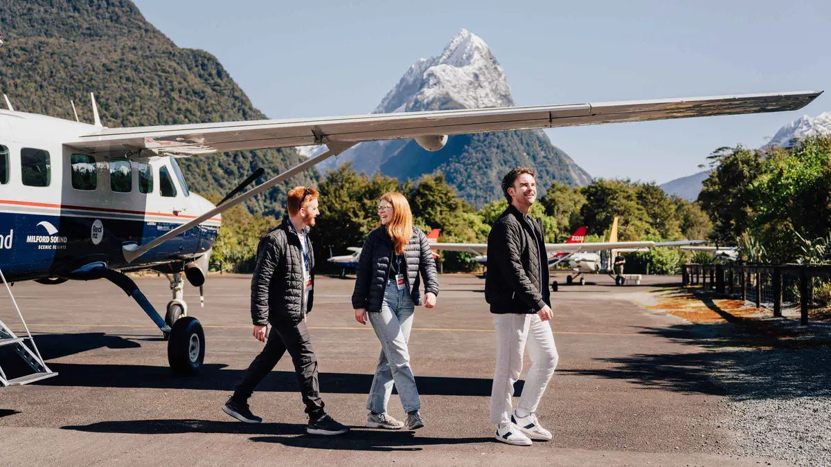 A light aircraft on the airstrip at the head of the fiord — Milford Sound day trip from Queenstown, New Zealand