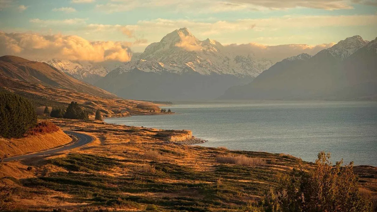 The turquoise water of Lake Pukaki with Aoraki behind it — Mount Cook from Queenstown, New Zealand